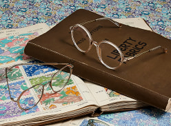 Win Liberty Tote Bags with a printed notebook and a voucher for Specsavers